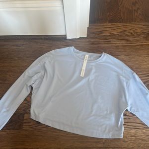 light blue long sleeve Lululemon top